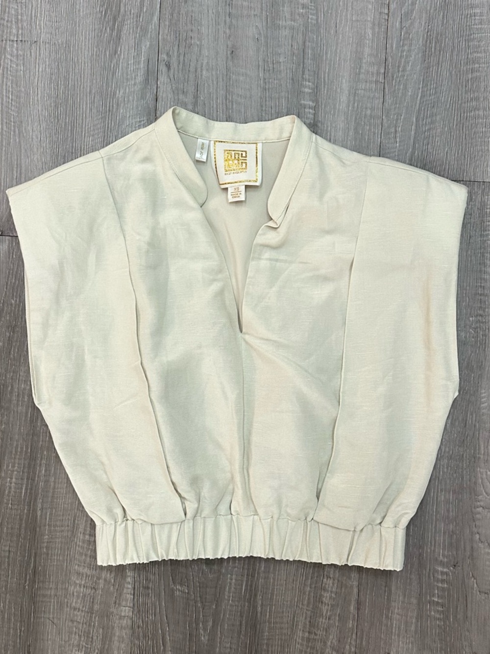 Emily McCarthy Designer Cream Sleeveless Elastic Hem Top
